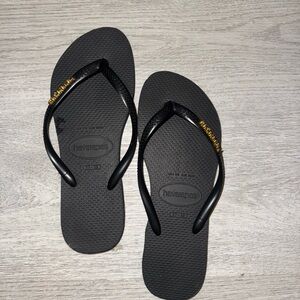 Havaianas Black Sandals with Gold Details